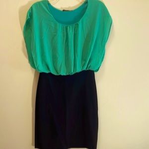 Teal top with a lace flower, pencil skirt, all in one